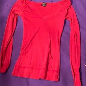 Red v-neck long sleeved shirt